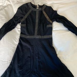 Black long sleeve dress with leather trim